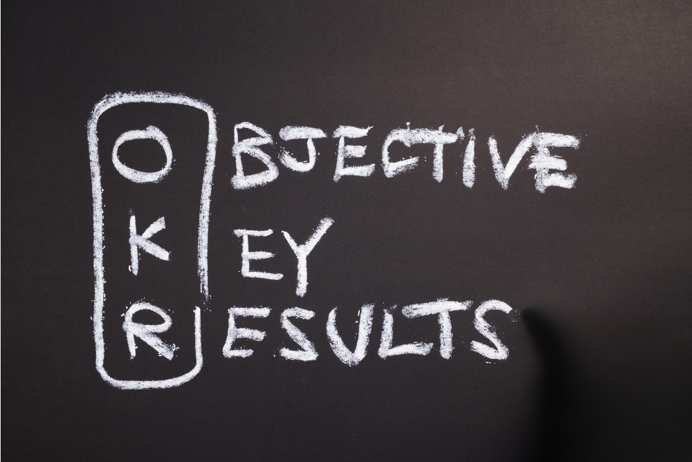 OKR implementation - image of OKR written on blackboard Objective, Key , Results